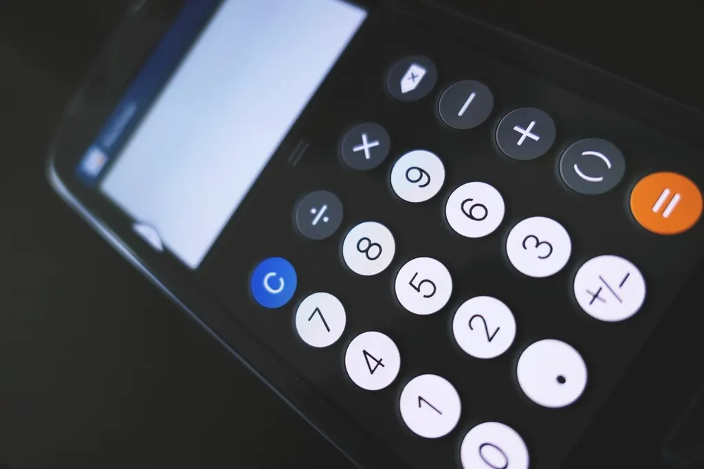 A phone calculator being used to check a planned amount